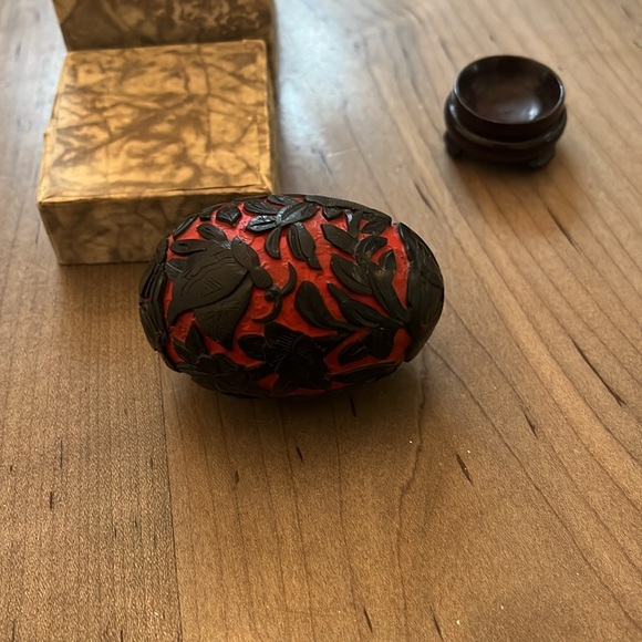 Hand Carved Cinnabar Egg with Wooden Stand. Floral Design. In Box with stand. - Picture 2 of 2